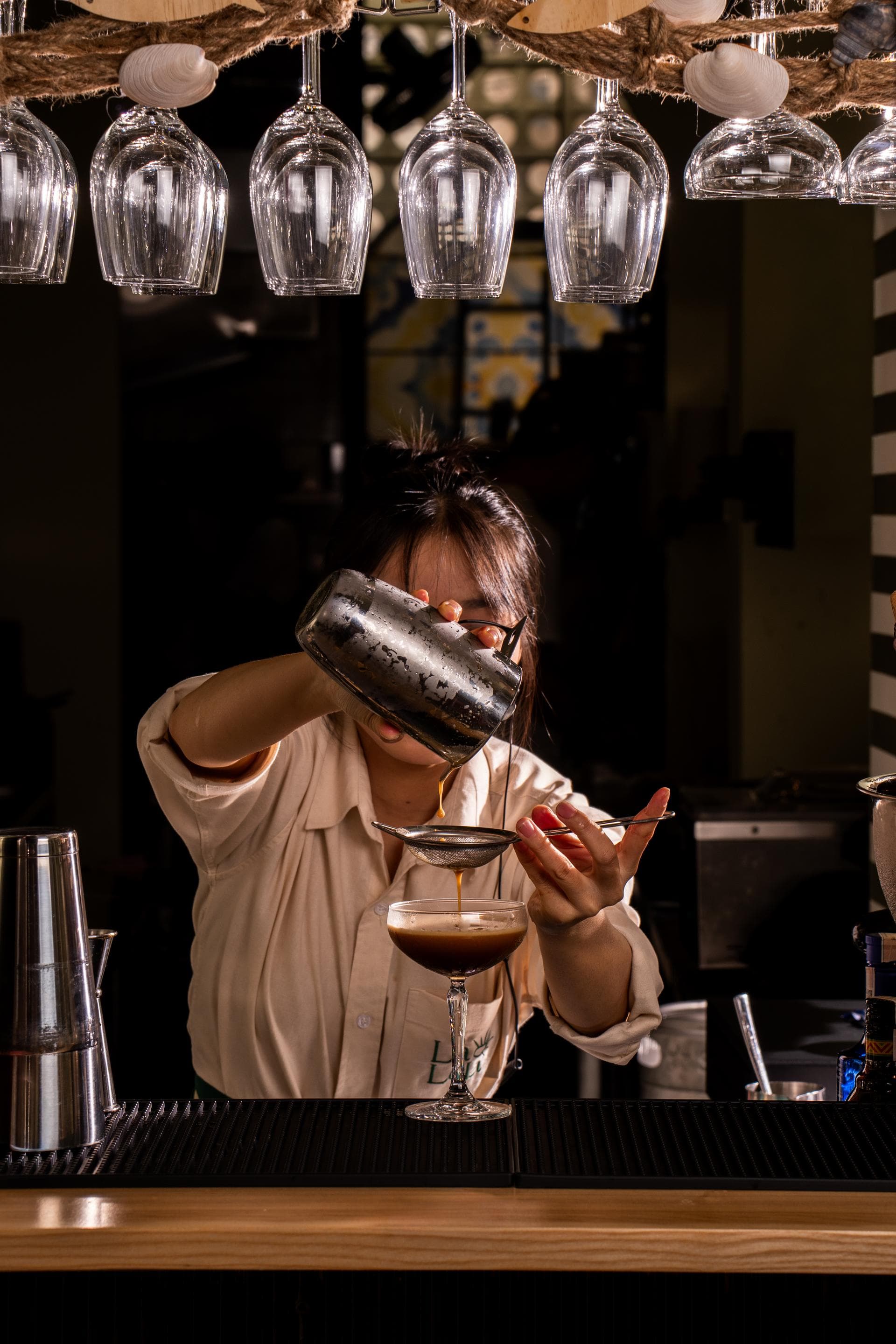 Bartender making espresso martini