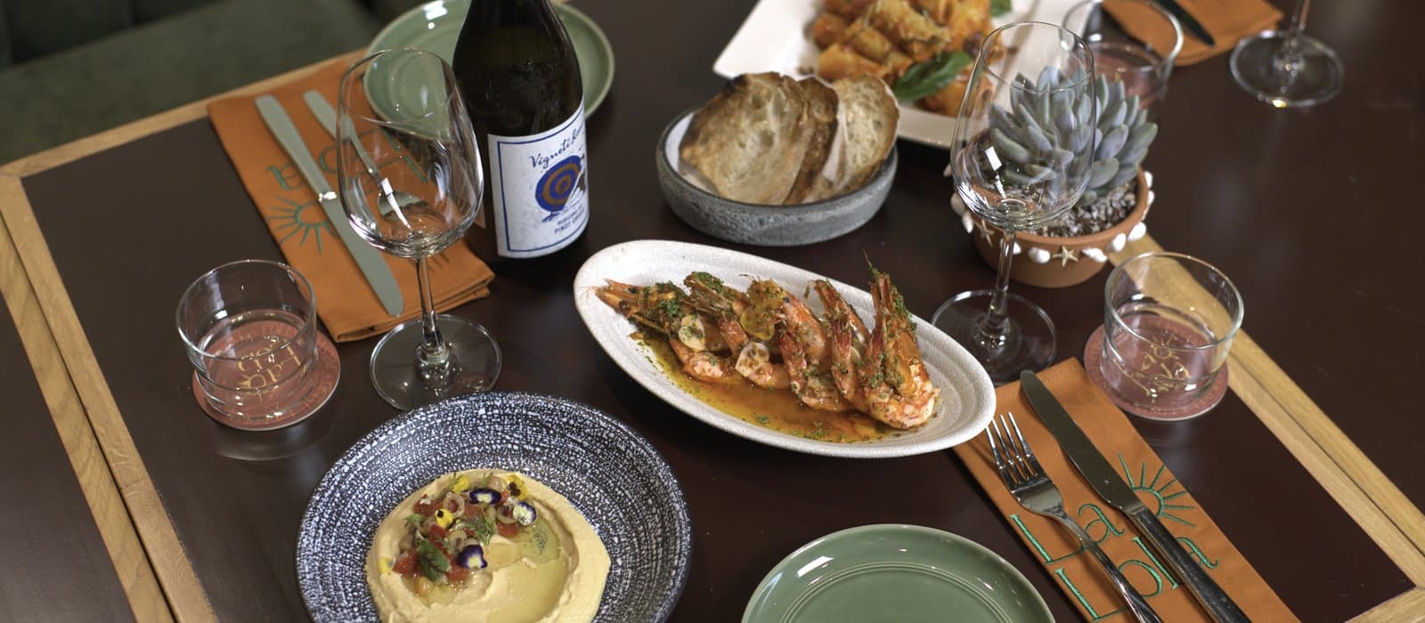 Mediterranean starters - hummus with pita bread and olives